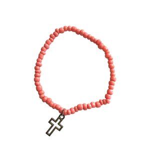 PINK BEADED ELASTIC BRACELET WITH CROSS CHARM